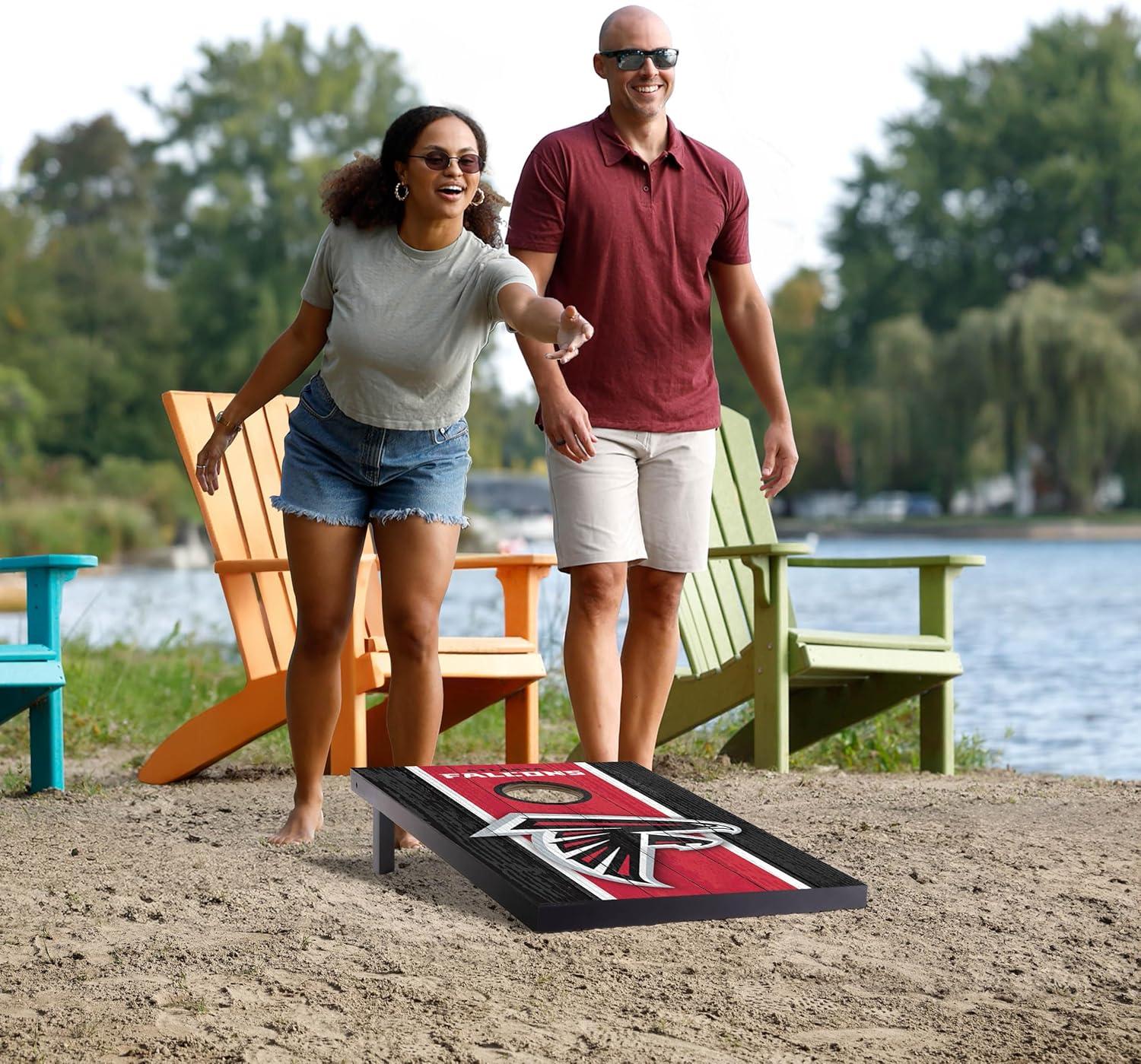 imageYouTheFan NFL 2 x 3 Portable Cornhole Game with Logo BagsAtlanta Falcons