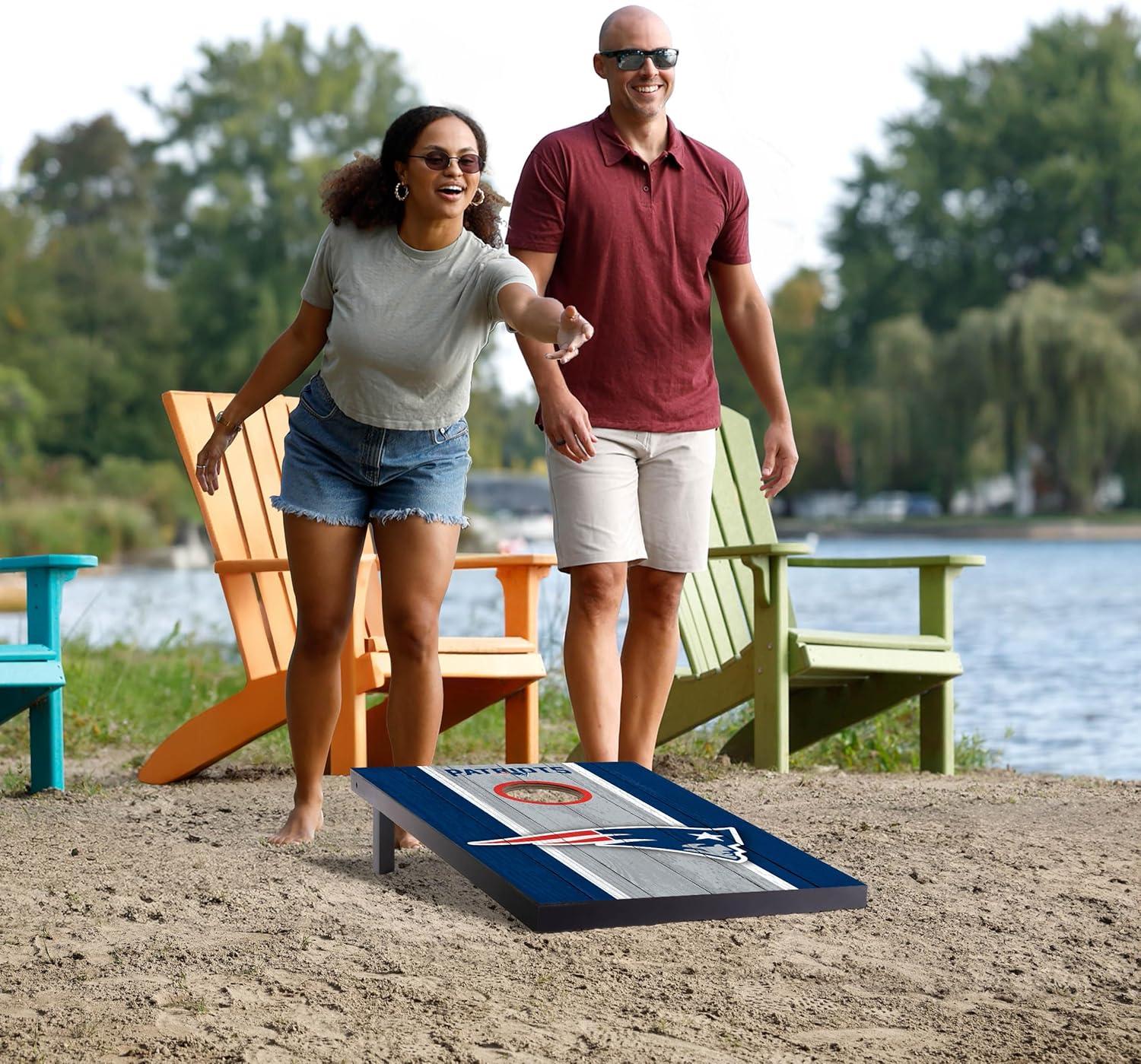 imageYouTheFan NFL 2 x 3 Portable Cornhole Game with Logo BagsNew England Patriots
