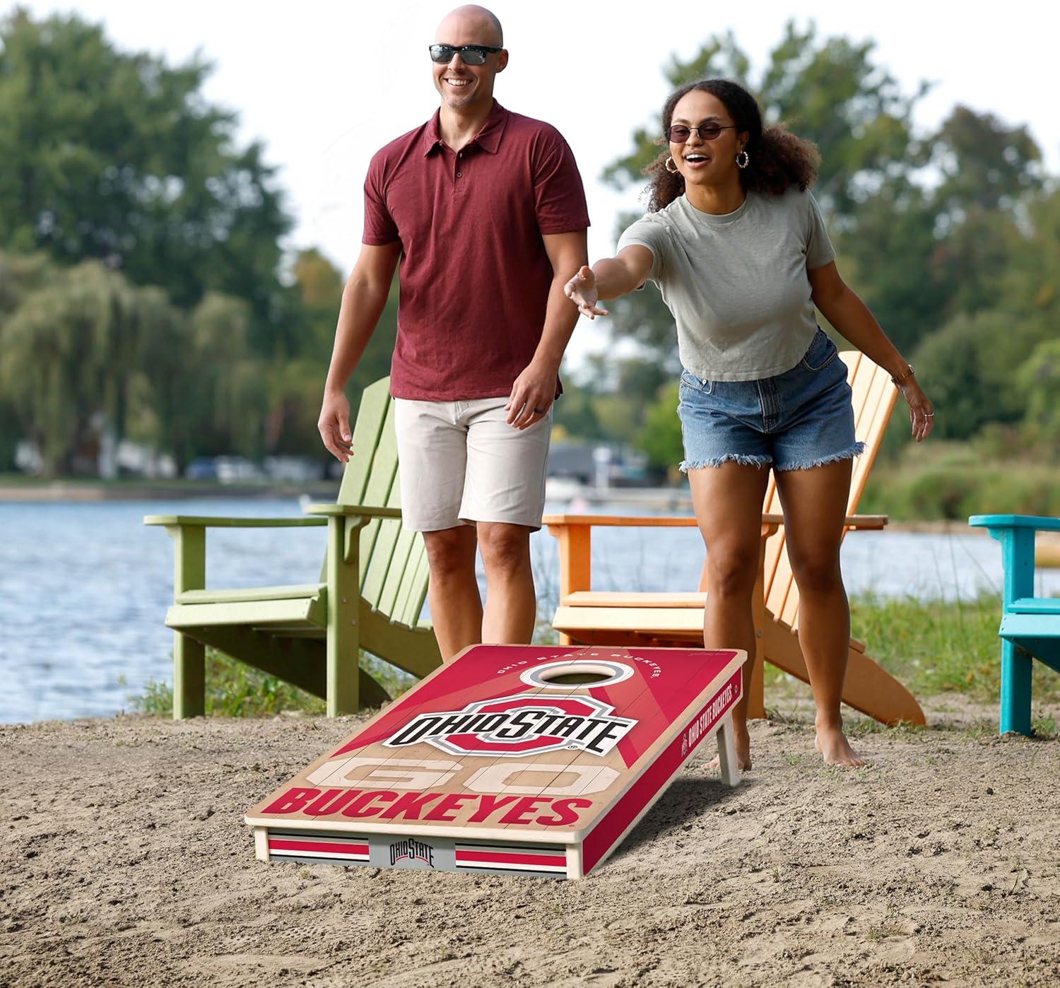 imageYouTheFan NCAA 2 x 4 Slogan Series Professional Wood Cornhole Game with Logo BagsOhio State Buckeyes