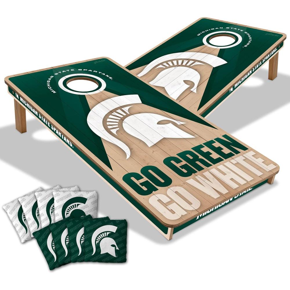 imageYouTheFan NCAA 2 x 4 Slogan Series Professional Wood Cornhole Game with Logo BagsMichigan State Spartans