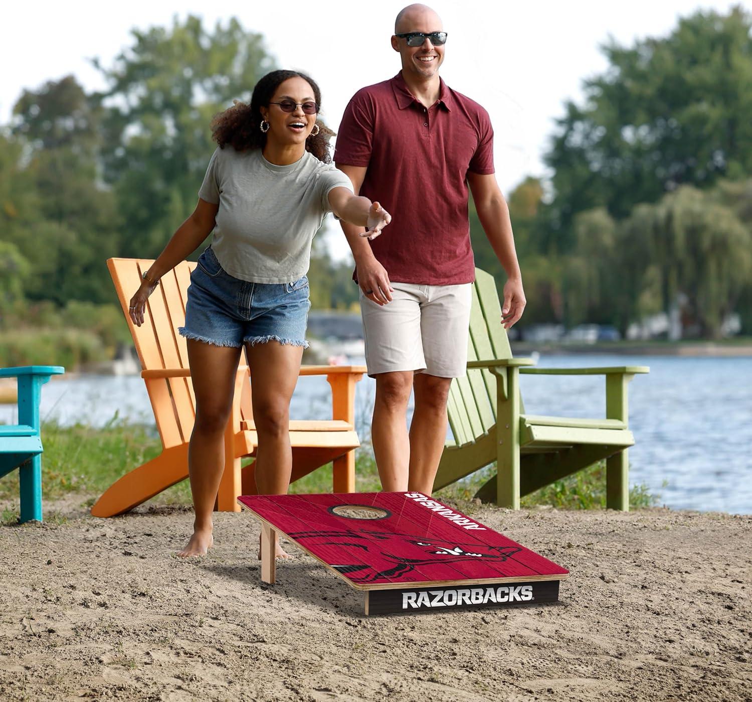 image:imageYouTheFan NCAA 2 x 3 Wood Cornhole Game with Logo BagsArkansas Razorbacks
