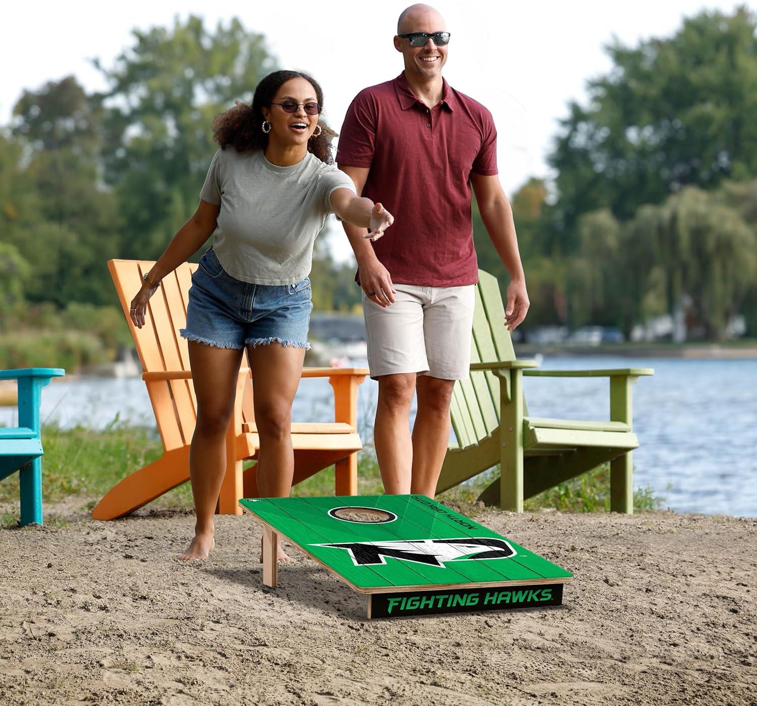 image:imageYouTheFan NCAA 2 x 3 Wood Cornhole Game with Logo BagsNorth Dakota Fighting Hawk