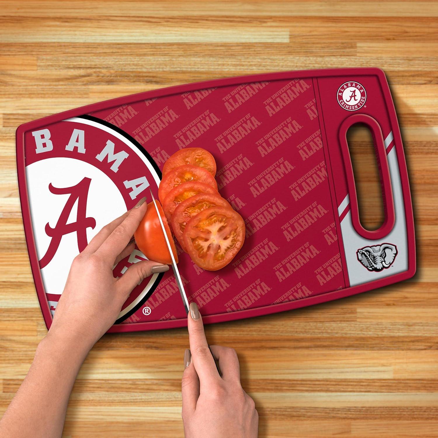 image:imageYouTheFan NCAA Officiallylicensed Logo Series Cutting Board reversible design for double the cutting surface gentle on knives team message on both front and backAlabama Crimson Tide