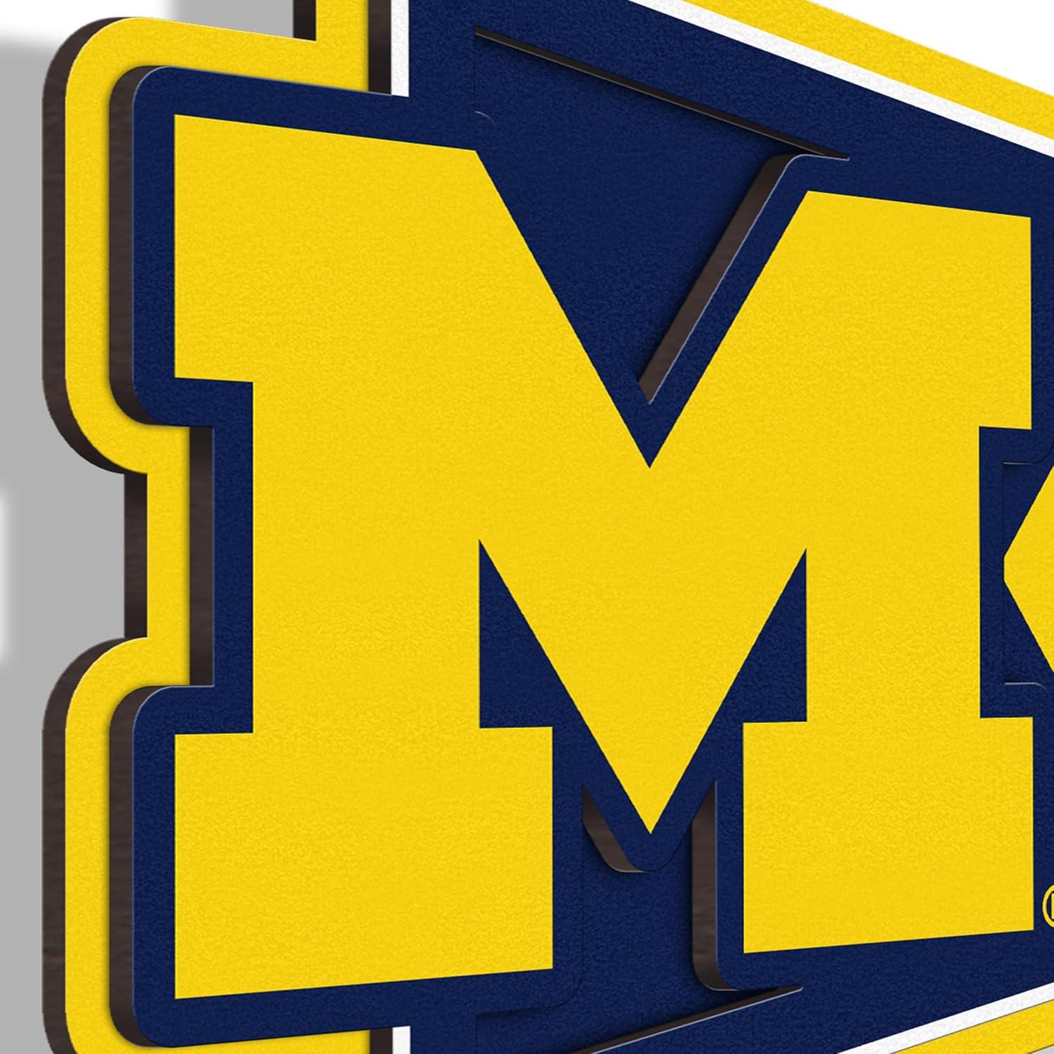 image:imageYouTheFan NCAA 3D Wall Pennant precisioncrafted unique shape made of multiple layers readytohang officially licensed and stylish addition for ultimate team fanMichigan Wolverines
