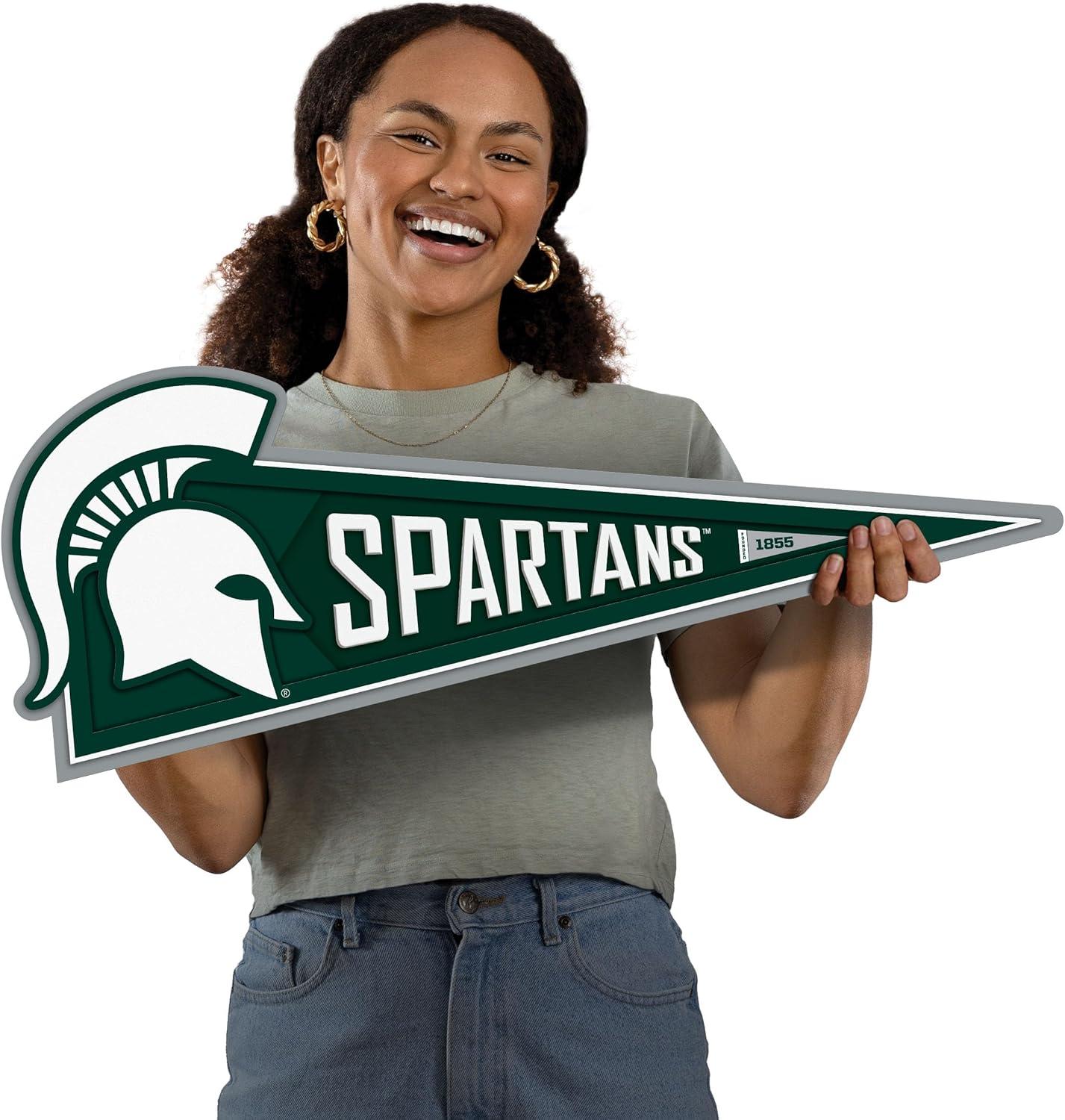 image:imageYouTheFan NCAA 3D Wall Pennant precisioncrafted unique shape made of multiple layers readytohang officially licensed and stylish addition for ultimate team fanMichigan State Spartans