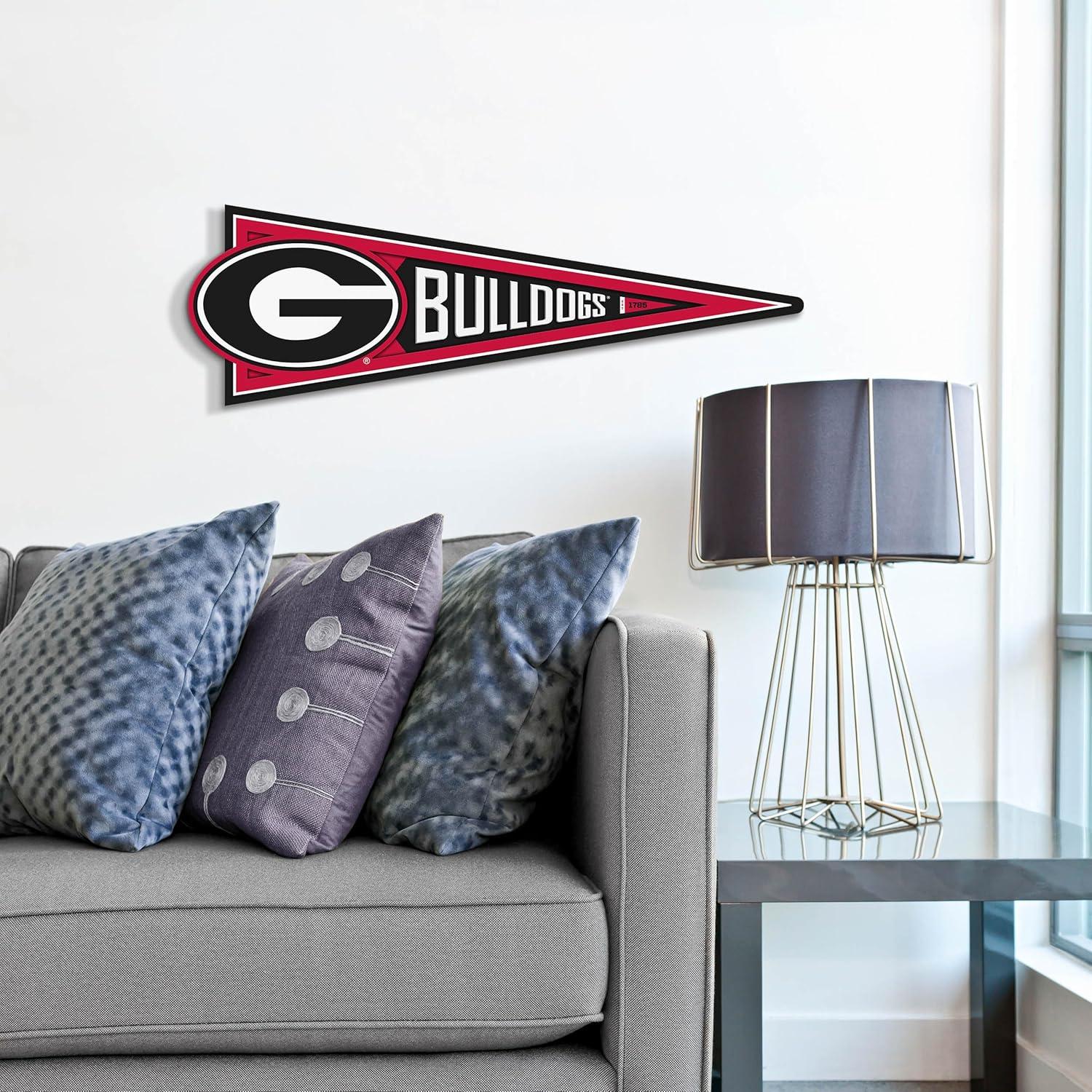 image:imageYouTheFan NCAA 3D Wall Pennant precisioncrafted unique shape made of multiple layers readytohang officially licensed and stylish addition for ultimate team fanGeorgia Bulldogs