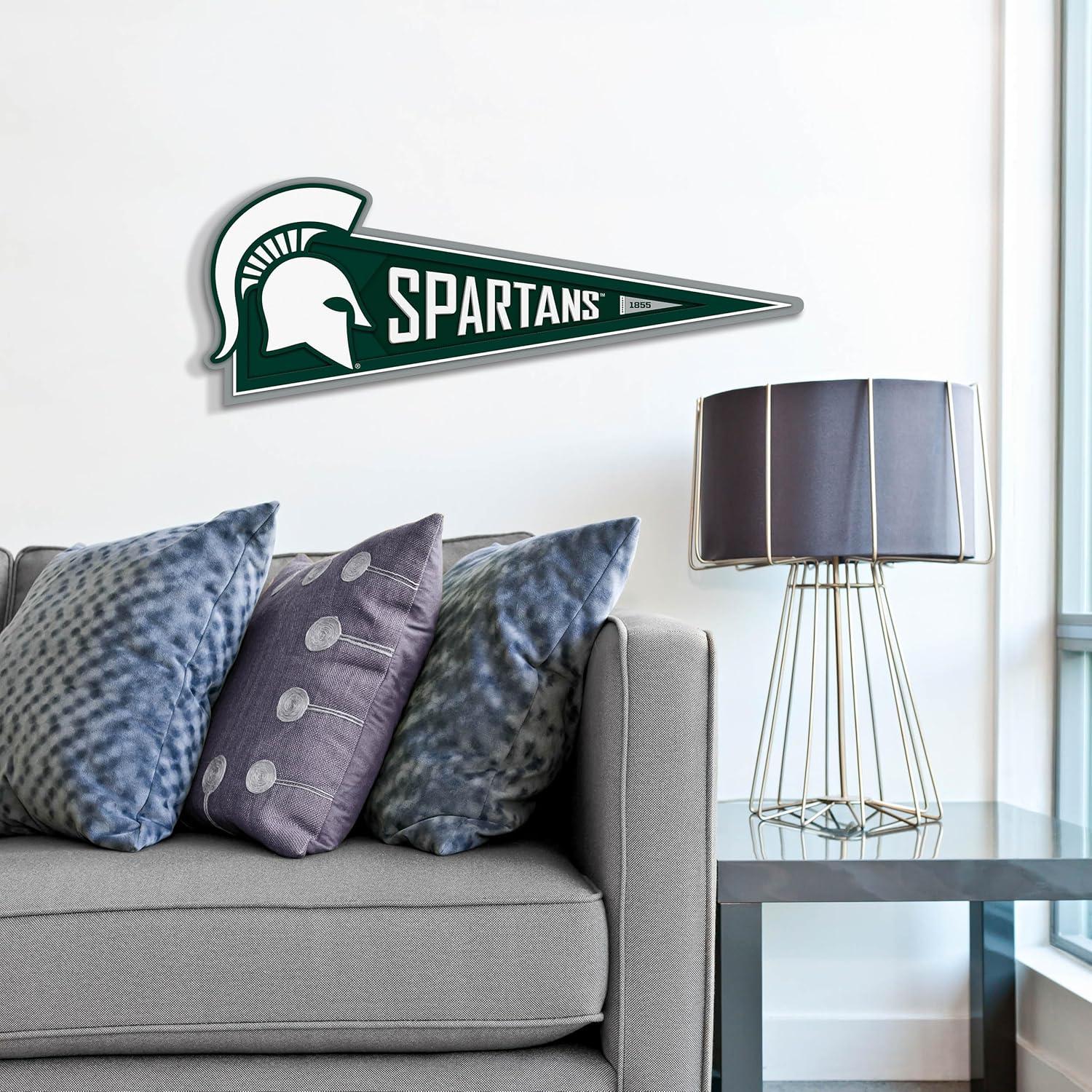 image:imageYouTheFan NCAA 3D Wall Pennant precisioncrafted unique shape made of multiple layers readytohang officially licensed and stylish addition for ultimate team fanMichigan State Spartans