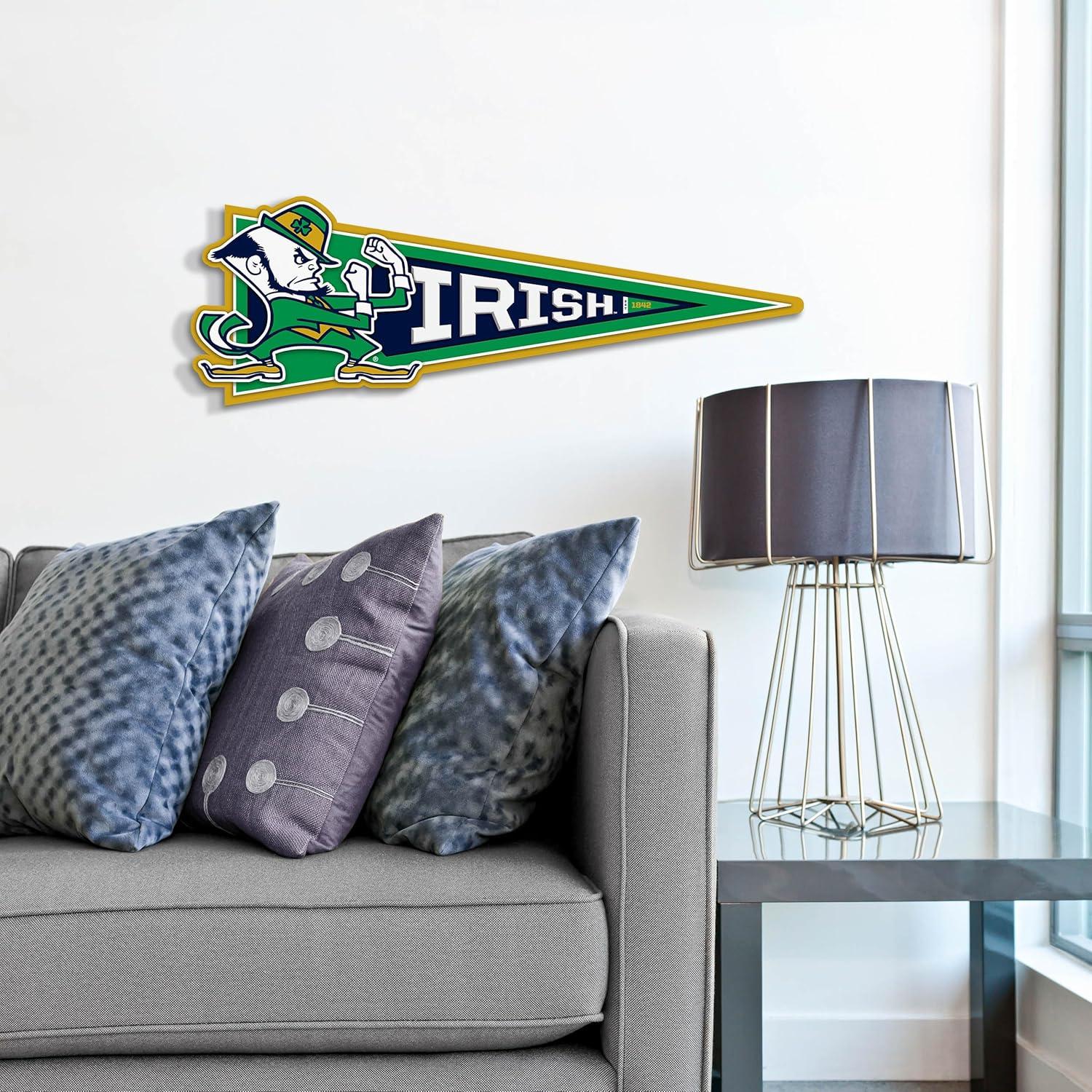 image:imageYouTheFan NCAA 3D Wall Pennant precisioncrafted unique shape made of multiple layers readytohang officially licensed and stylish addition for ultimate team fanNotre Dame Fighting Irish